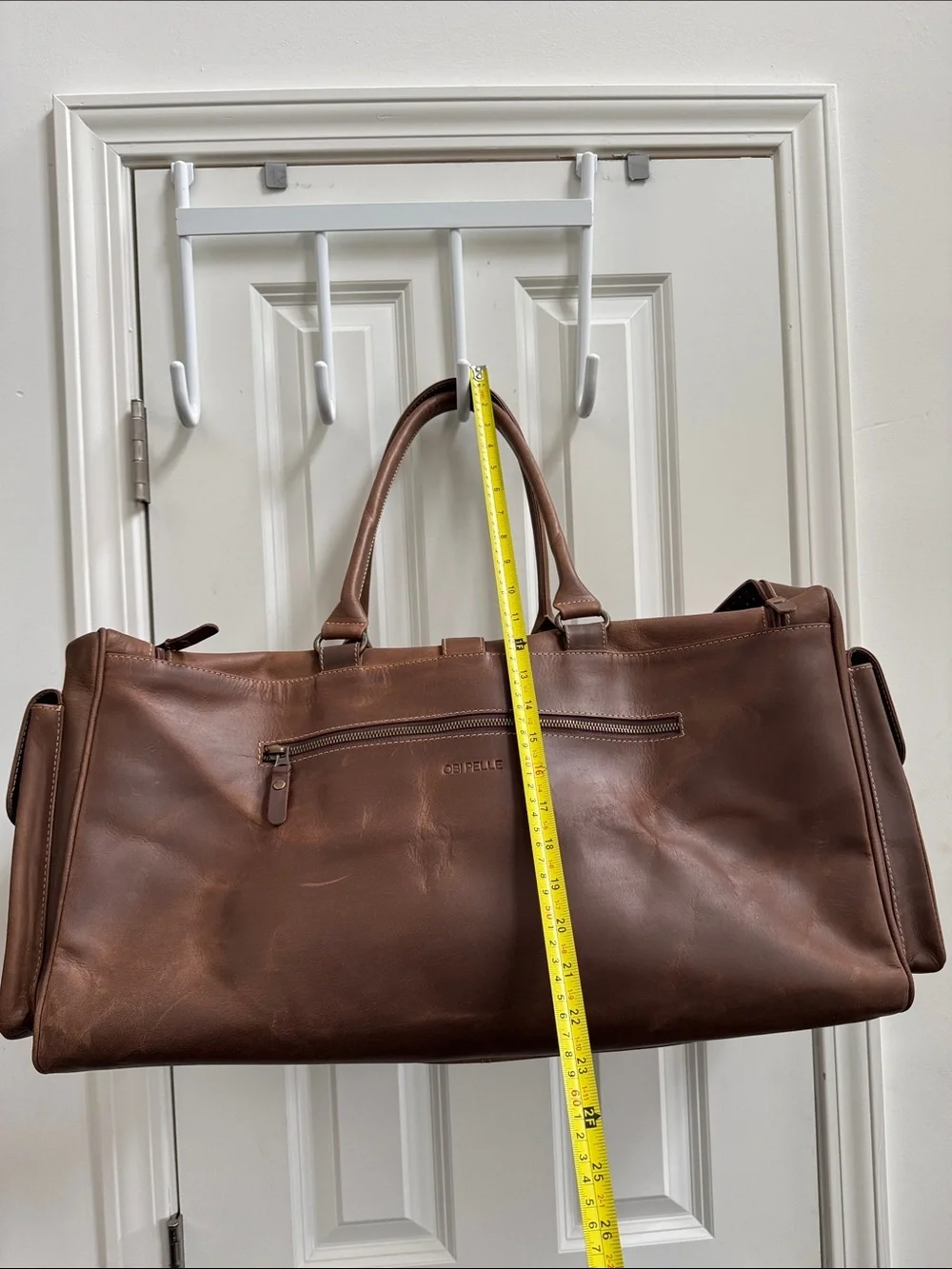 Classic Brown Distressed Leather Duffel Bag with Front Buckle Pocket, no strap